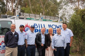 Bill Haws, general manager (left) and owners Bill and Tina Howe (center) stand with a few of their plumbers. Retailers could benefit by offering clients like Bill Howe Plumbing’s on-site delivery.