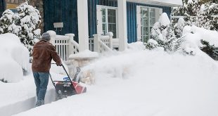Man Using Snow Blower